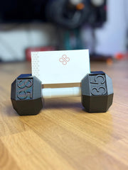 Dumbbell business card holder for desks and gyms