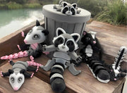 Articulated raccoon, fox, skunk and opossum with mini trash can or tree stump