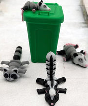 Articulated raccoon, fox, skunk and opossum with mini trash can or tree stump