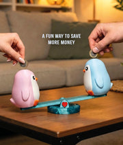 Partner Piggybank Penguins – Interactive Saving Seesaw for Two