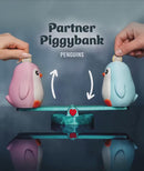 Partner Piggybank Penguins – Interactive Saving Seesaw for Two